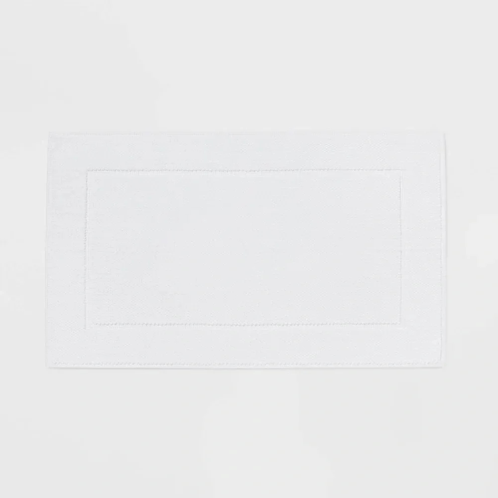 Elegant White Bath Mat Threshold